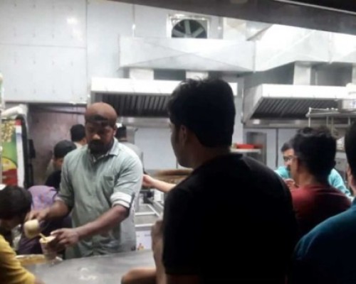 Hotel-Durga-employee-serving-Cold-Coffee to-customers